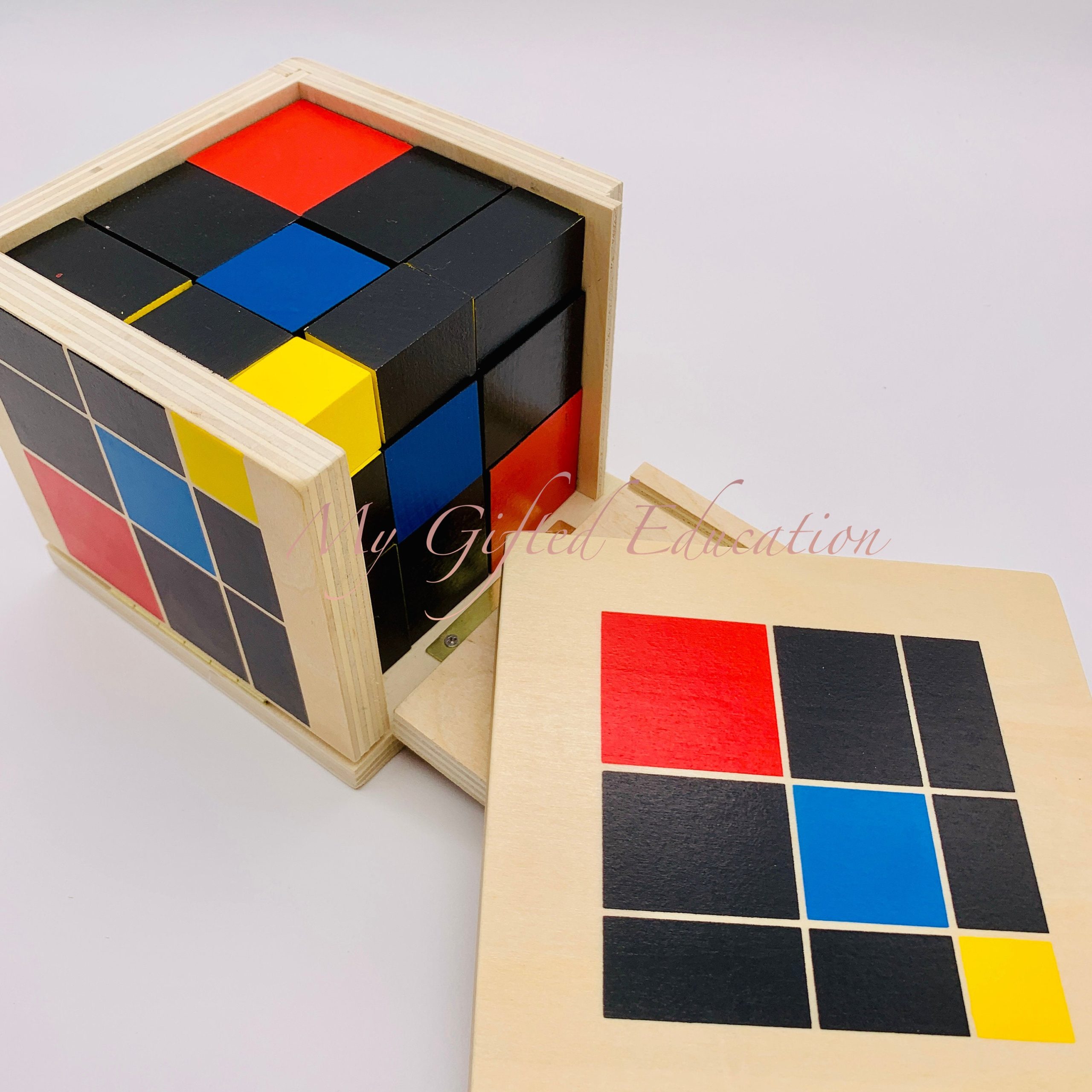 Montessori Trinomial Cube. The three-dimensional puzzle made up of 27  wooden blocks which is…